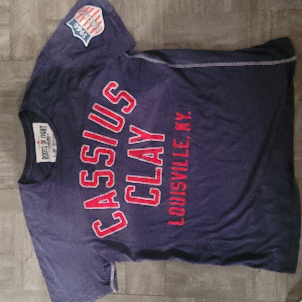 Roots Of Fight, Large,Blue Cassuis Clay t- shirt